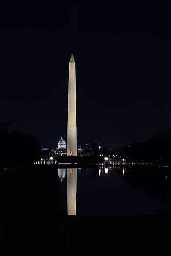 USA, District of Columbia. United States Capitol and Washington Monument at Night Art Print